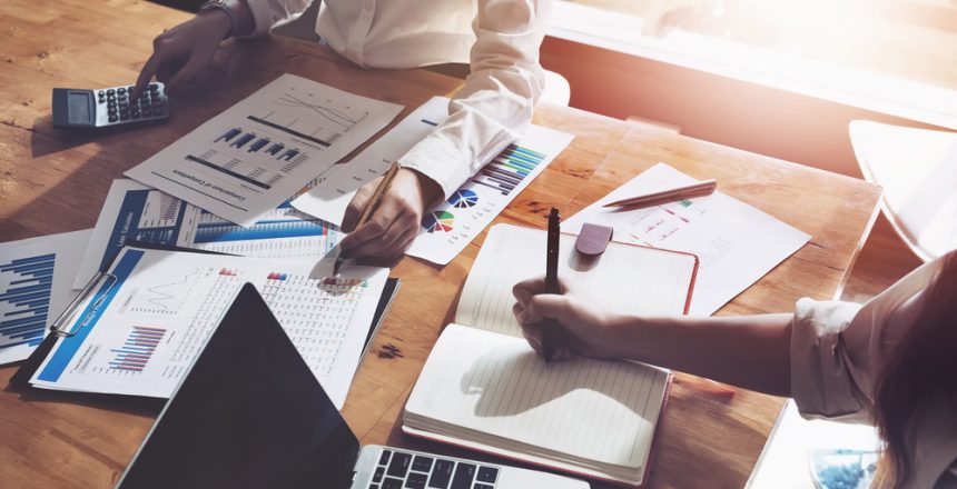 Business,Consulting,Or,Finance,Budget,Plan,,Business,Advisor,Holding,Pen